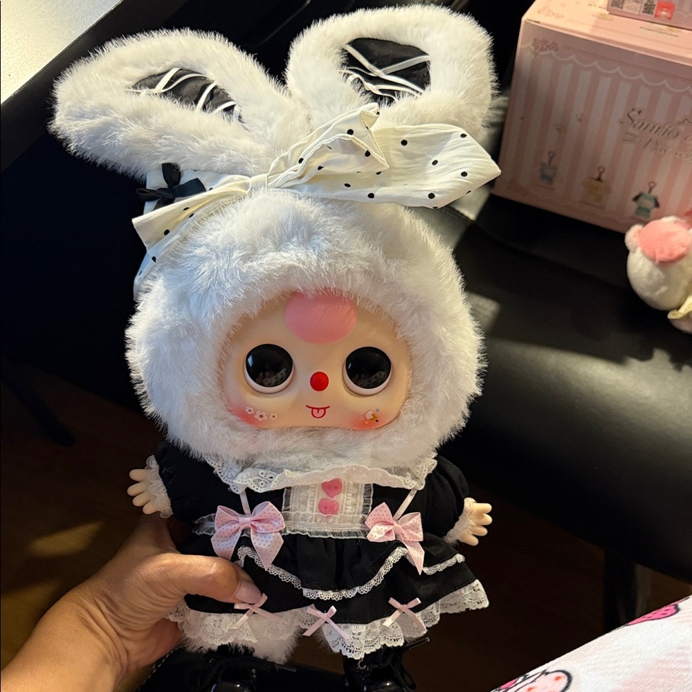 Adorable Bunny-Eared Doll with Pink Accents